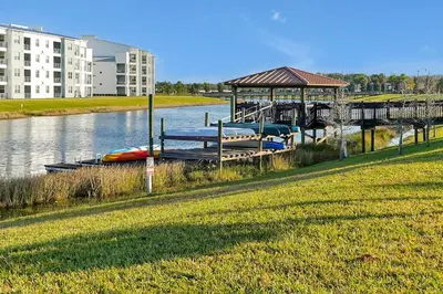 a group of boats are docked at a marina at Storey Lake Home: Pool, Gym, Lazy River & near Disney in Kissimmee