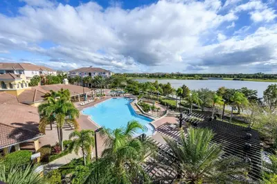 an aerial view of a swimming pool at a resort at Updated 3BR Condo near Convention Center & Epic in Orlando