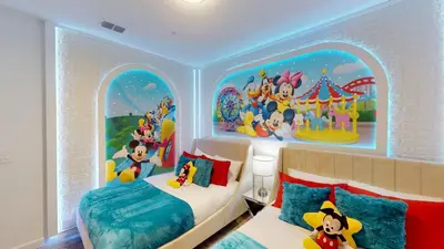 a bedroom with a mickey mouse themed room at Storey Lake Resort 1119 - Hosted by Top Villas in Kissimmee