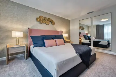 a bedroom with a large bed and a mirror at Formosa Valley Resort 62 - Hosted by Top Villas in Orlando