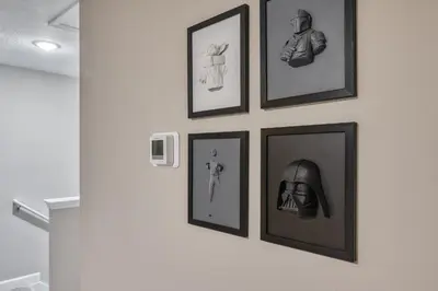 a group of framed pictures on a wall at Formosa Valley Resort 64 - Hosted by Top Villas in Orlando