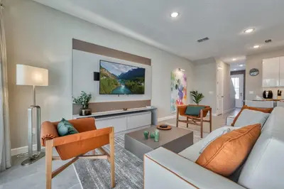 a living room with a couch and a table at Formosa Valley Resort 64 - Hosted by Top Villas in Orlando