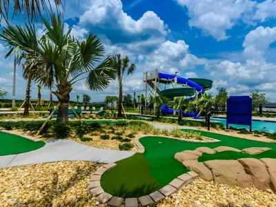 a miniature golf course at the resort with a slide at Beautiful 5bed home with Free Resort Access 4817 in Kissimmee
