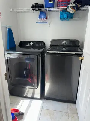 a kitchen with a stove and a dishwasher at Magical Home with private pool and close to parks in Kissimmee