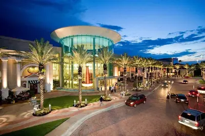 a street with cars parked in front of a building at Luxury Ranch Master King Bed with heated Salted Pool in Orlando
