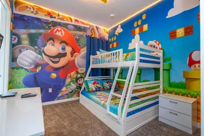 a bedroom with a mario room with a wall mural at Luxury 3BR home with Mario Bros Room Near Disney in Orlando