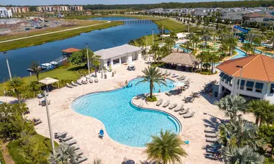 an aerial view of a pool at a resort at Elegant 2Bed Condo in Storey Lake Prime Location in Kissimmee