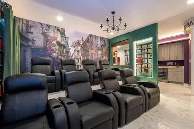 a movie room with a bunch of chairs in it at The Best Paradiso Vacation House in Orlando