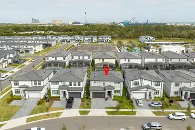 an aerial view of a residential neighborhood with houses at Relax at Paradiso Grande Resort in Orlando