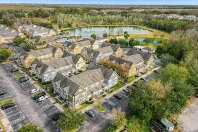 an aerial view of a residential neighborhood with houses at 3 Bedroom 2 Bathroom Villas At SevenDwarfs 27-106 in Kissimmee
