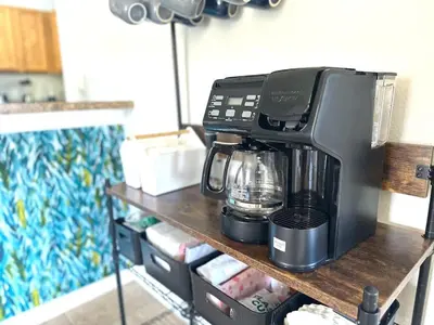 a coffee maker sitting on top of a shelf at Amazing! Disney 7 Min, Walmart 1 min, 3 Bed 2 bt in Orlando