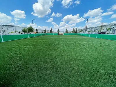a large soccer field with green grass on it at Luxury 6 Bedroom 5 bath poolHome 214 in Orlando