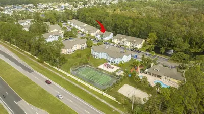an aerial view of a house with a tennis court at Family Apt very close to Disney in Kissimmee