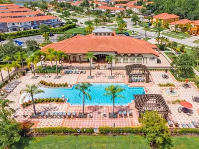 an aerial view of a pool at a resort at Luxury 4 bedroom 3 bath pool Home 283 in Kissimmee
