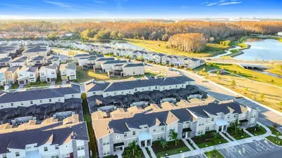 an aerial view of a village with houses at Incredible Family Retreat with PS5 Private Pool and access to 2 Clubhouses in Kissimmee