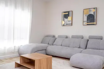 a living room with a couch and a coffee table at 4812 BR - Enchanted Lakeside Escape Luxurious Family Retreat in Kissimmee