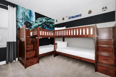 two sets of bunk beds in a room at Marvelous Home With Private Pool And Waterpark & Resort Access Near Disney At Encore Resorts Reunion - 7464Mr in Kissimmee