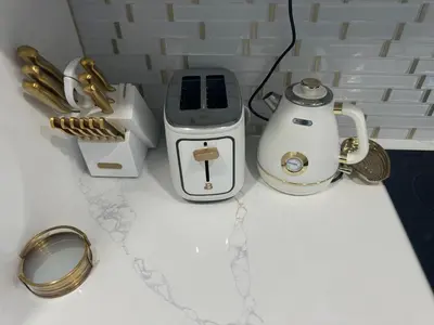a counter top with a blender and other appliances at Bloomslake Resort in Kissimmee