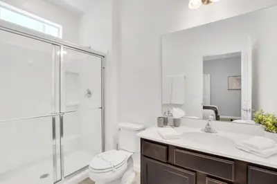 a bathroom with a shower and a toilet and a sink at Amazing Mansion on Veranda Palms Resort with the Best 5 Star Amenities Orlando Mansion 5533 in Kissimmee