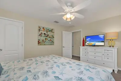 a bedroom with a bed and a ceiling fan at Luxury 5 Star Villa on Paradise Palms ResortMinutes from Disney World Orlando Townhome 5502 in Kissimmee