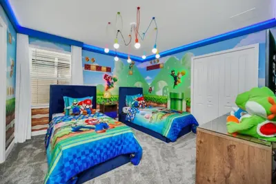 a childs bedroom with two beds and a room with nemo at Modern 9 Bedroom Oasis for Large Groups 6272 in Kissimmee