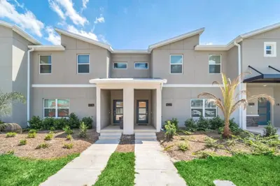a rendering of a large apartment building at Cozy 4 Bedroom Urban Oasis 6326 in Kissimmee