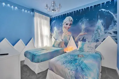 a room with two beds and a painting of a mermaid at Private Oasis: 6 Bedroom Villa Retreat 6327 in Kissimmee