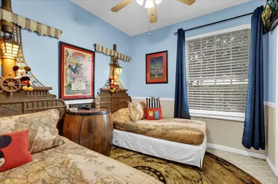 a bedroom with two beds and a window at Orlando Condo 6445: Family Fun Near Disney in Kissimmee