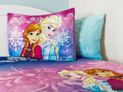 a bed with two disney princess pillows on it at Orlando Townhome 6458: Perfect Base for Your Disney Trip in Kissimmee