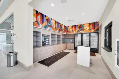 an office lobby with a colorful mural on the wall at Orlando Villa 6401 - Dream Stay at Paradiso Resort in Orlando
