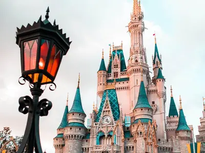 a castle in the background with a street light at Orlando Villa 6394 - Premium Villa at Windsor Hills in Orlando