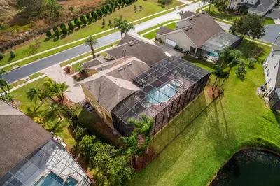 an aerial view of a house with a glass roof at 5 Star Mansion with Private Pool on Formosa Gardens Orlando Manion 5075 in Orlando