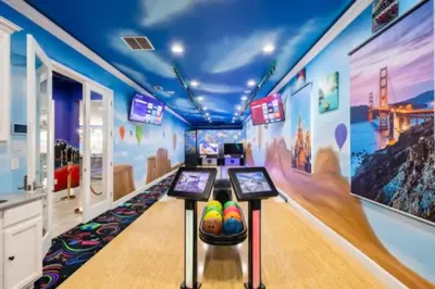 a bowling alley with a pin in a room at Exclusive Mansion with Large Private Pool on Veranda Palms Orlando Mansion 5378 in Kissimmee