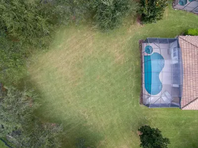 an overhead view of a lawn with a pool at Luxury Villa with Pool on Windsor Hills Resort Orlando Villa 5390 in Orlando