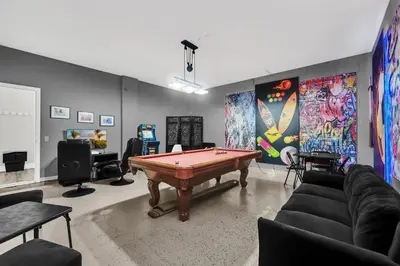 a room with a ping pong table in it at Dreamy 6 Bedroom Villa in Orlando6495 in Orlando