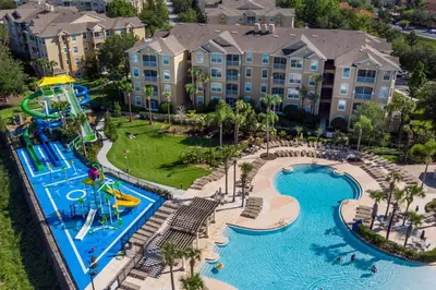 an aerial view of a water park at a resort at Cozy 3 Bedroom Haven in Orlando6497 in Orlando