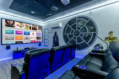 a star wars movie room with a wheel on the wall at Charming Orlando Villa with 5 Bedrooms6499 in Orlando