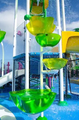 a water slide with green bowls on a roller coaster at Charming Orlando Villa with 5 Bedrooms6499 in Orlando