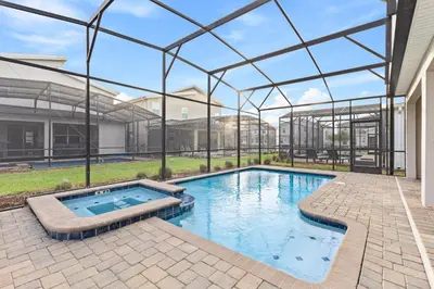 a swimming pool in a building with a glass ceiling at 2869 Epic Themed Mega Home at Storey Lake 7DB in Kissimmee