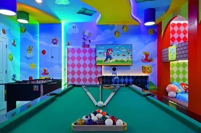 a billiard room with a pool table at Epic Family Getaway: Themed Villa Near Disney ! in Kissimmee