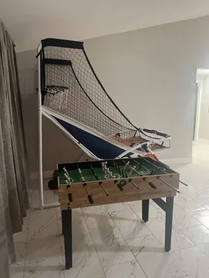 a volleyball net sitting on top of a table at The Secret Garden Games Getaway in Orlando