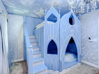 a childs bedroom with a castle themed room at Magical Mansion - 15 Min to Disney - Storey Lake in Kissimmee