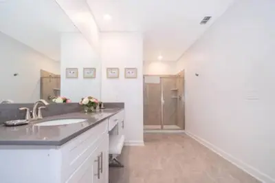 a bathroom with a sink and a toilet at Serene Rhyme Escape in Kissimmee