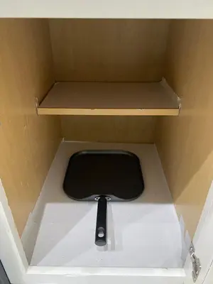 a toilet in a box with a shelf at Four Seasons Vacation, heated Pool, 3mile 2 Disney in Kissimmee