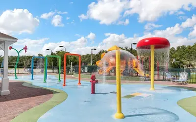 a water park with a fountain with a fire hydrant at 4 Bedroom 3 Bathroom Villas At SevenDwarfs 20-102 in Kissimmee