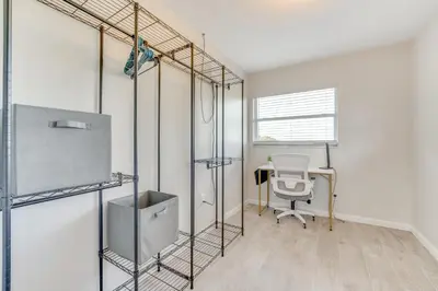an office with a desk and a chair in a room at Nature-Packed Family Escape Near Lake Tohopekaliga in Kissimmee
