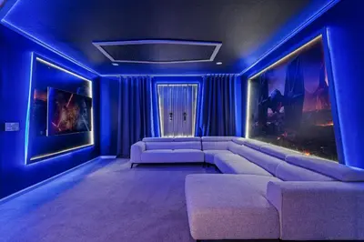 a living room with a couch and blue lighting at Paradiso Grande Resort 9Bedroom Vacation Home 6210 in Orlando