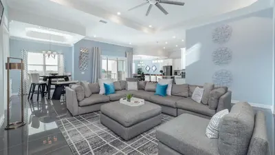 a living room with a couch and a table at CTD4751-401 in Kissimmee