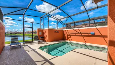 a swimming pool in a building with a glass ceiling at CUP8946 in Kissimmee