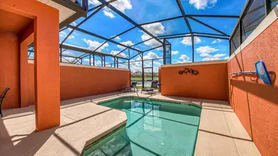 a swimming pool in a building with a glass ceiling at CUP8946 in Kissimmee